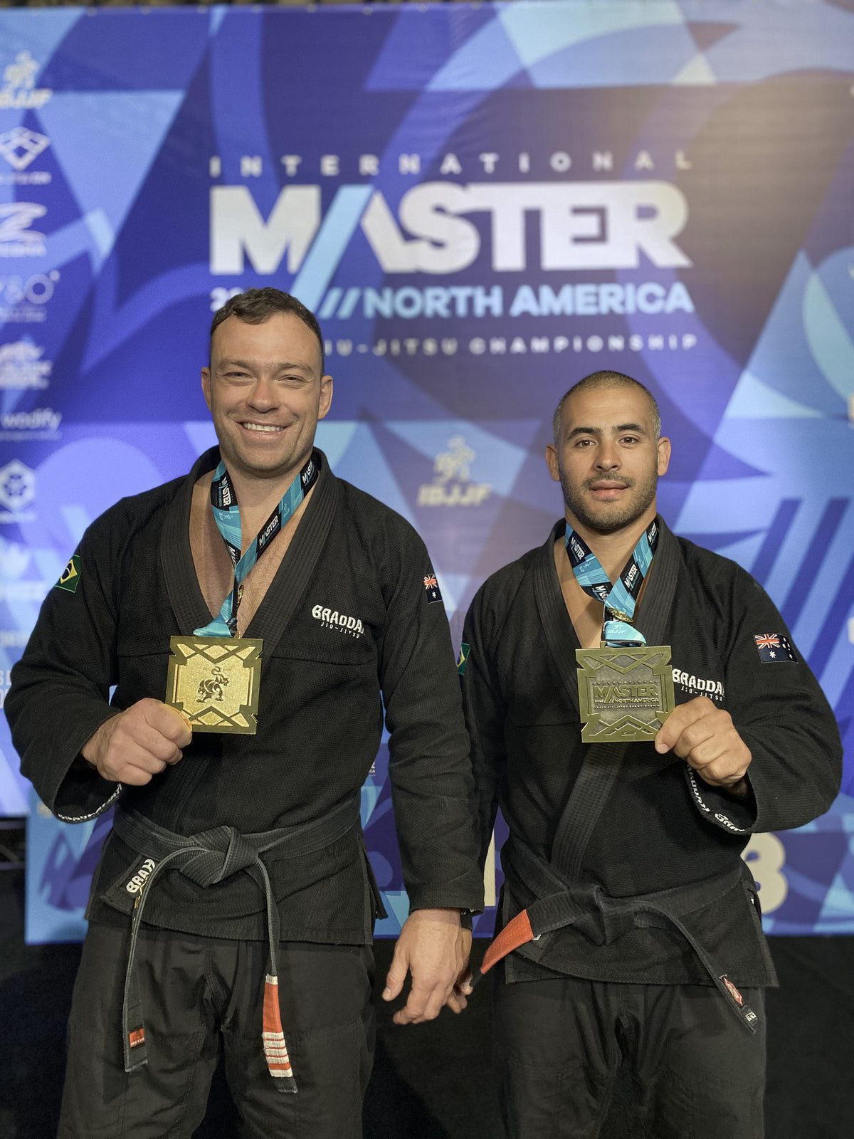 Braddah Jiu-Jitsu athletes holding medals after competing at an international Brazilian Jiu-Jitsu championship