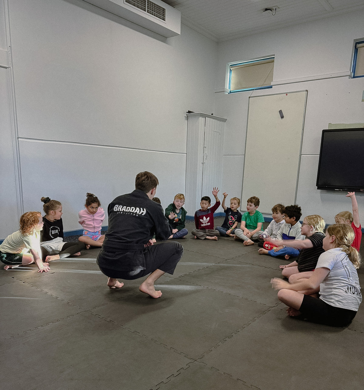 Braddah Jiu-Jitsu instructor teaching children during a kids martial arts class