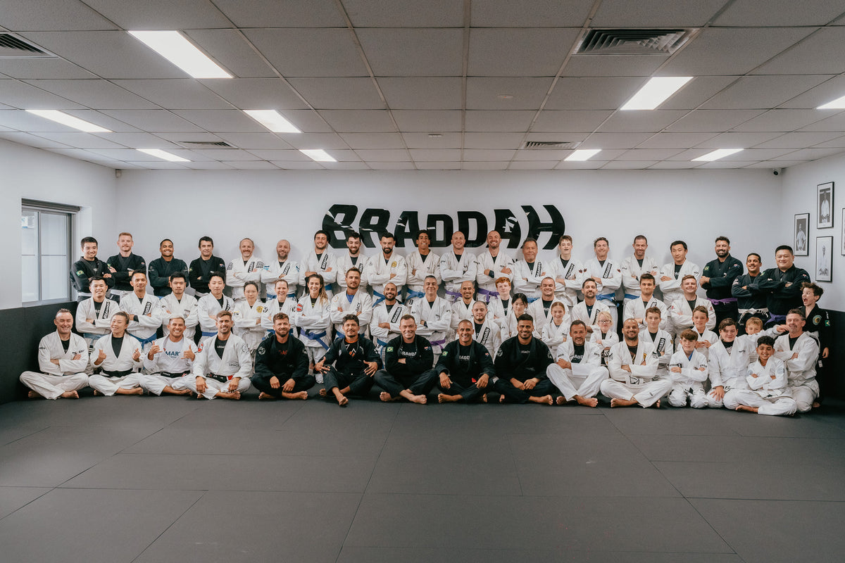 Braddah Jiu-Jitsu Sydenham students and instructors posing together in the academy