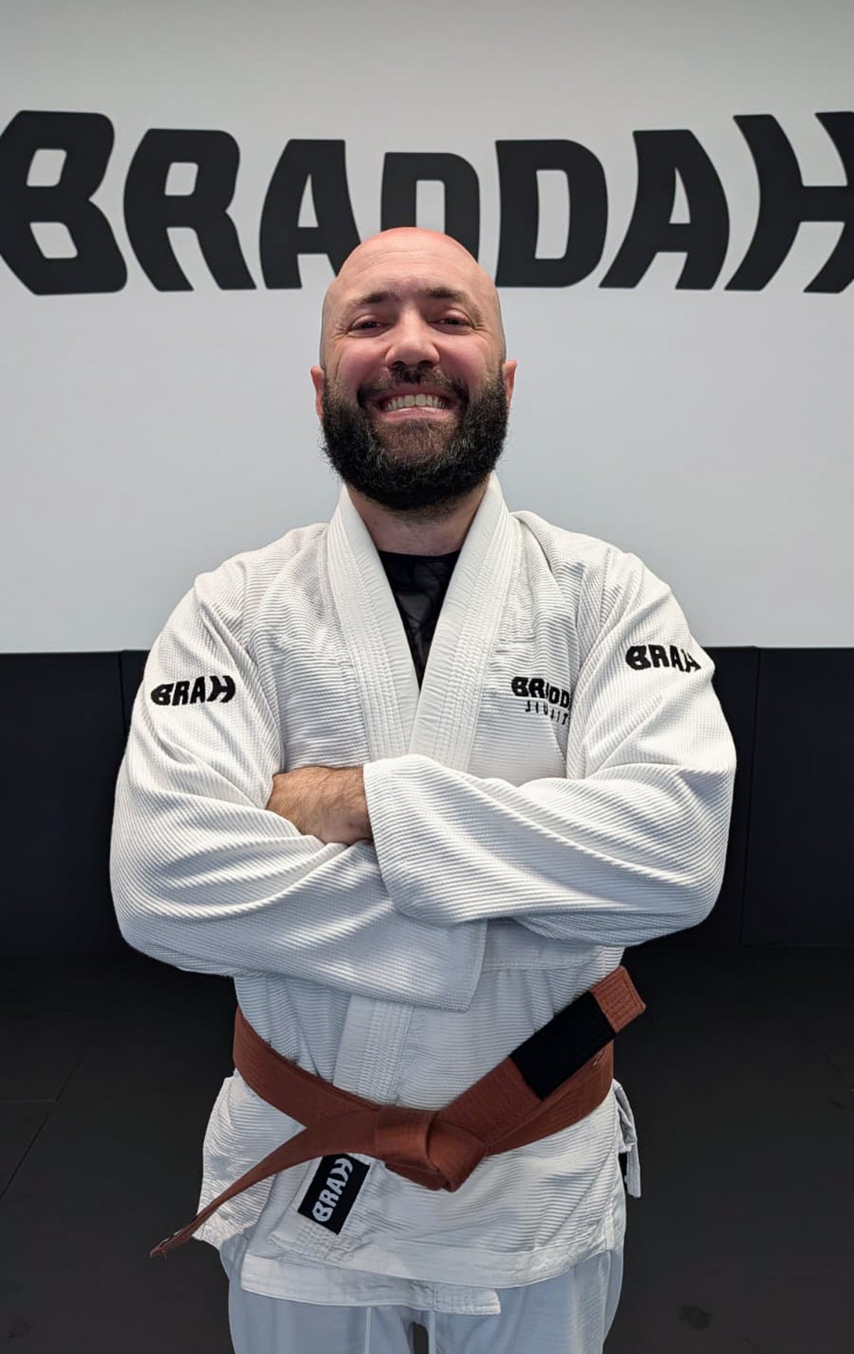 Braddah Jiu-Jitsu coach wearing a brown belt and gi