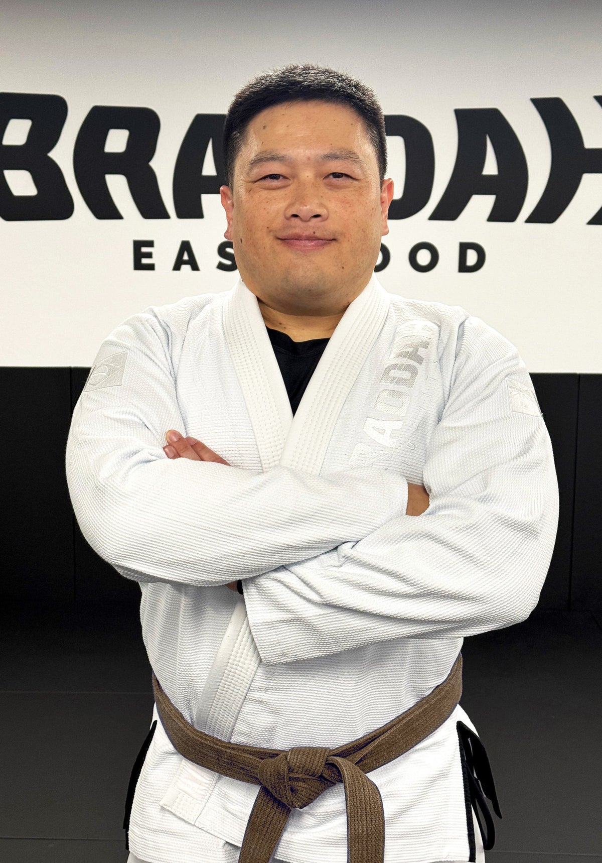 Leo Kwok, Braddah Jiu-Jitsu coach wearing a brown belt